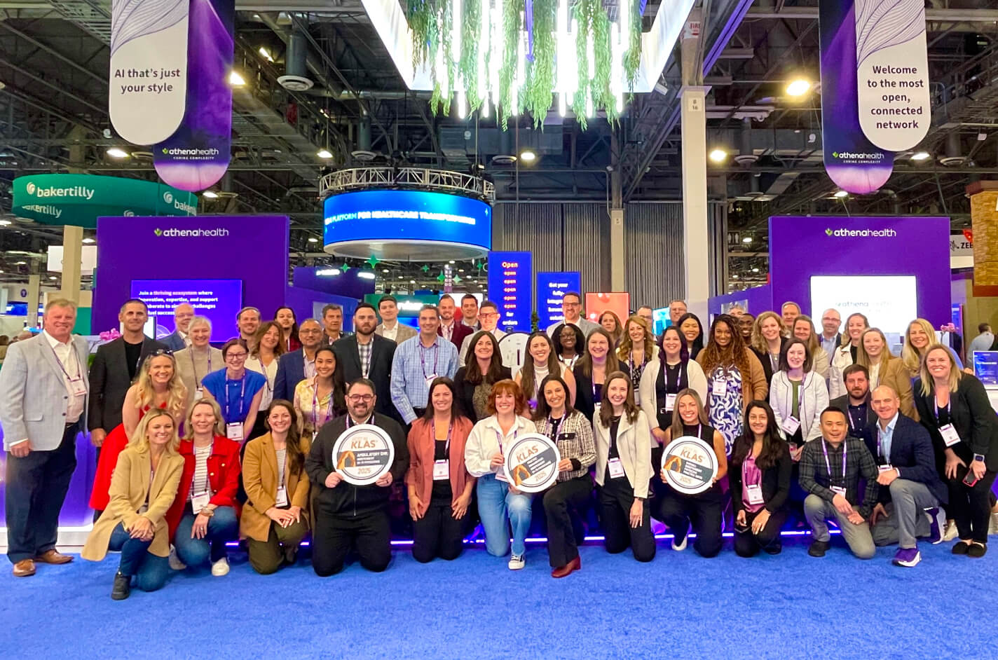 athenahealth employees pose for a picture at HIMSS 2025 Conference